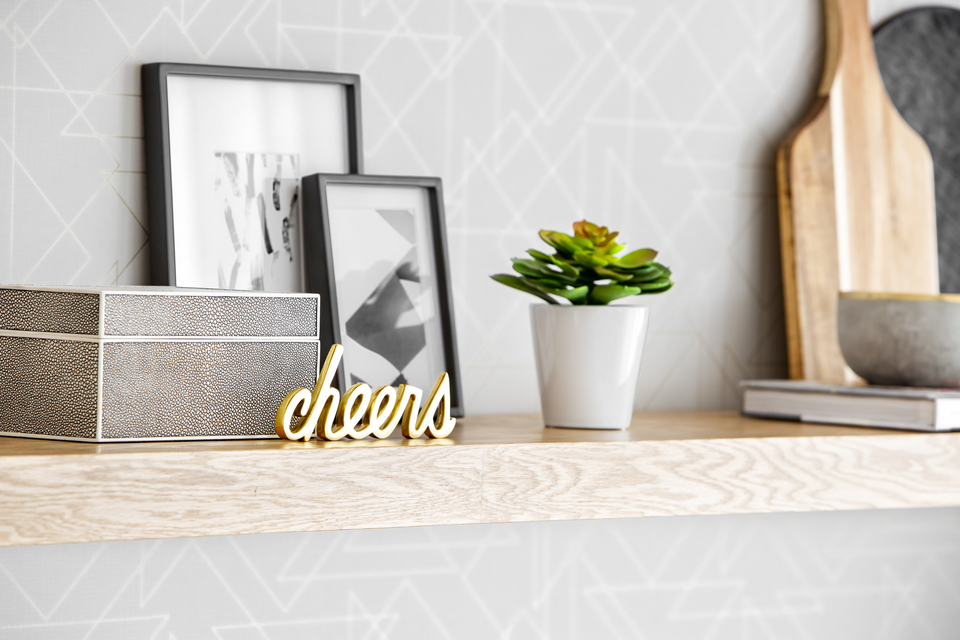 Design by Hibou Design + Co with decorated shelving